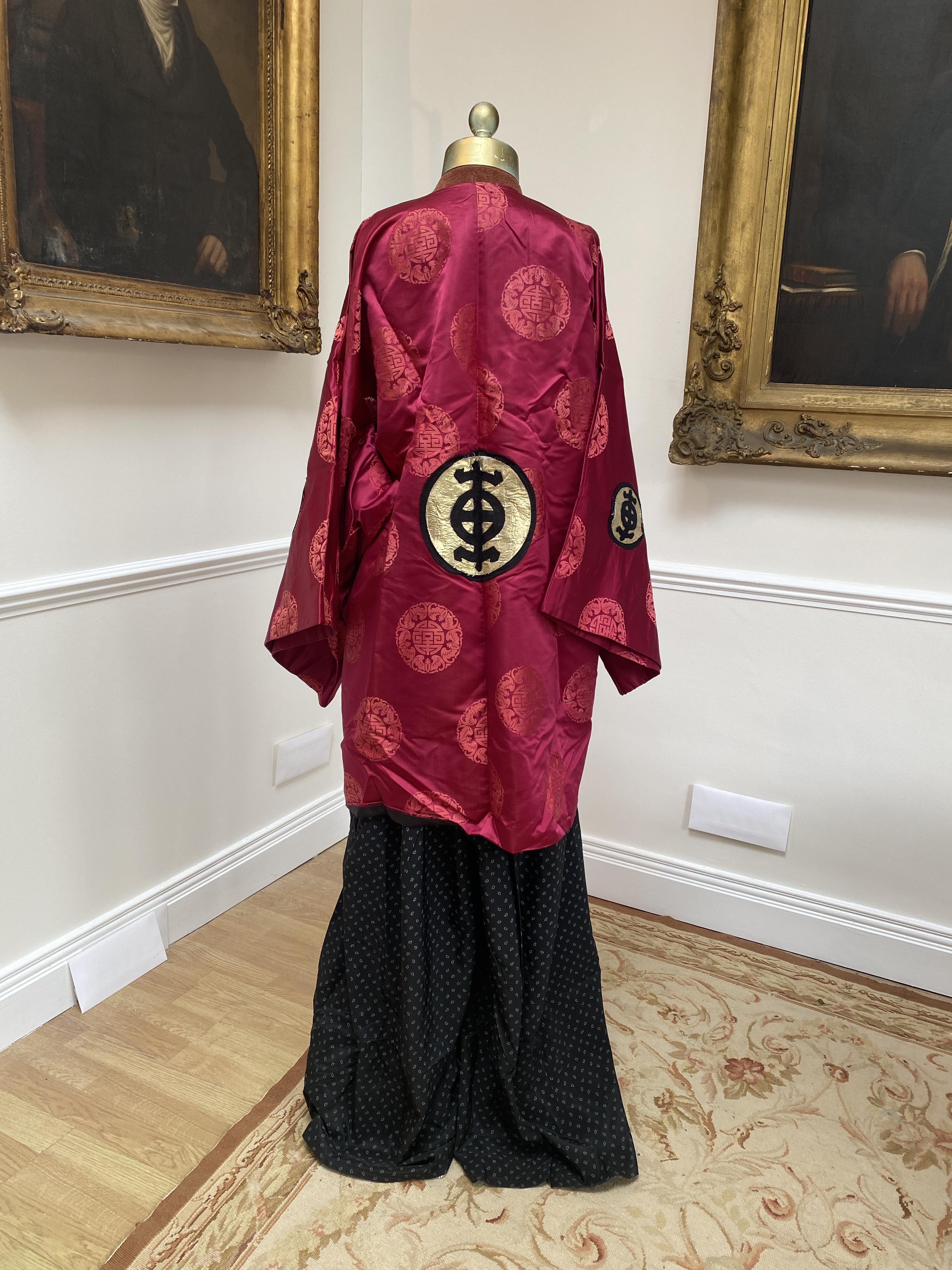 A Japanese men’s outfit (The Bonze – Madame Butterfly), black blouse and pantaloons and maroon silk tunic. Size M/L